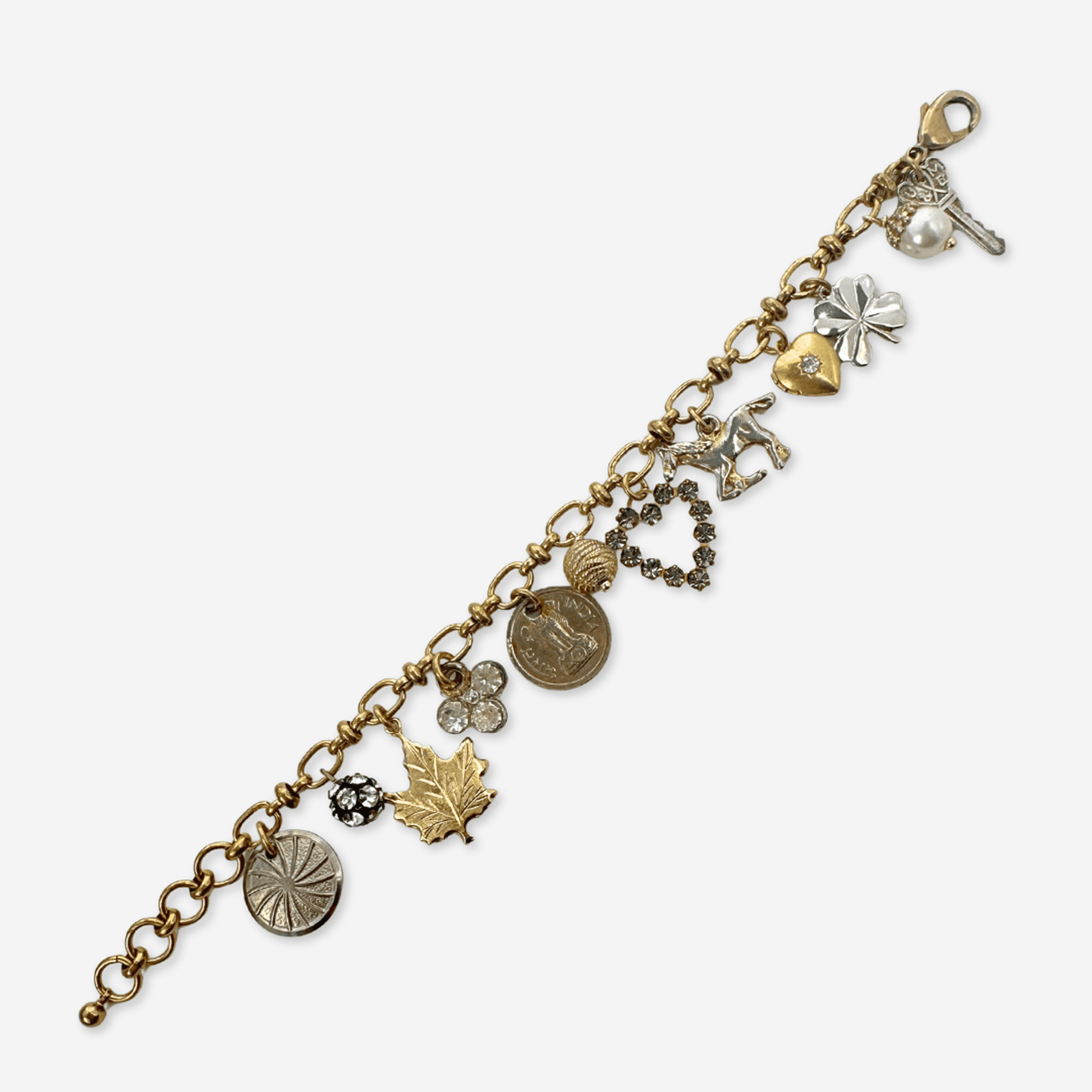 Repurposed vintage mixed metal charm bracelet