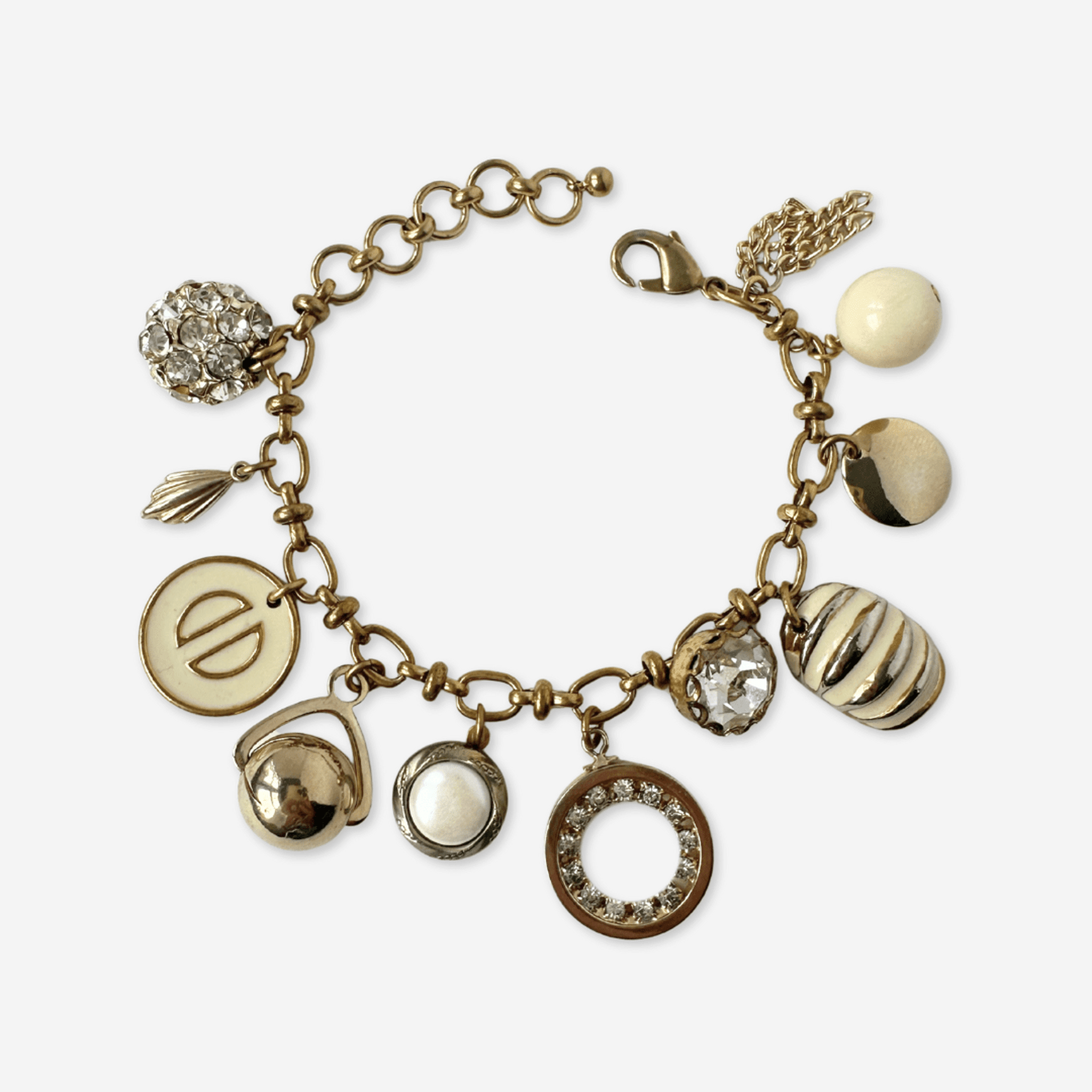Repurposed vintage cream and gold mixed charm bracelet