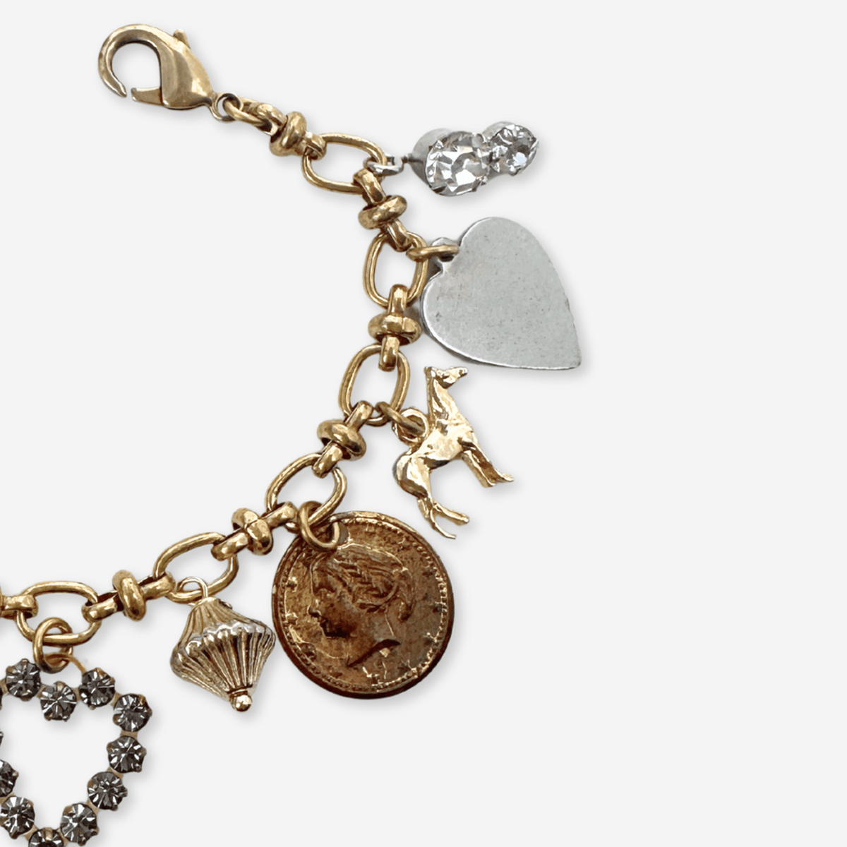 Repurposed vintage mixed metal charm bracelet