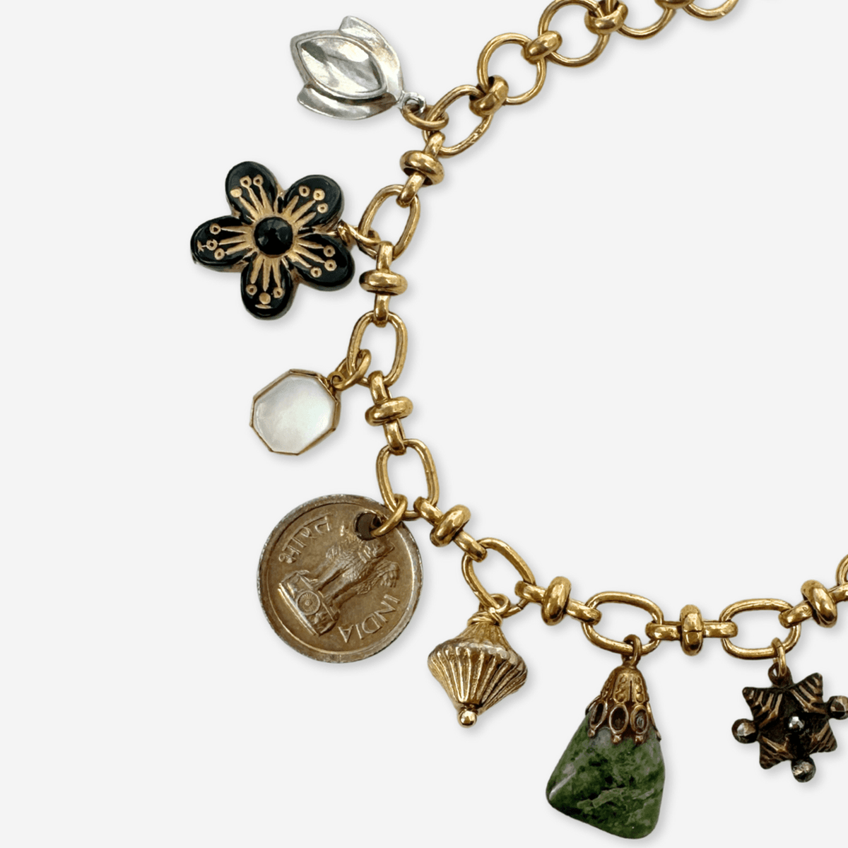 Repurposed vintage mixed charm bracelet