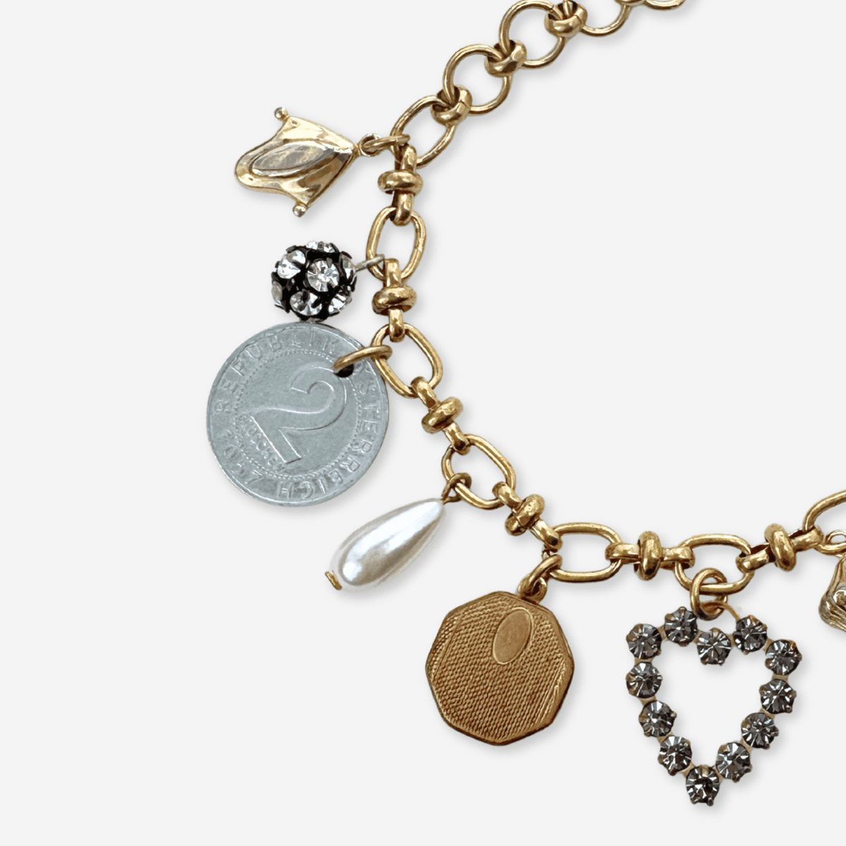 Repurposed vintage mixed metal charm bracelet