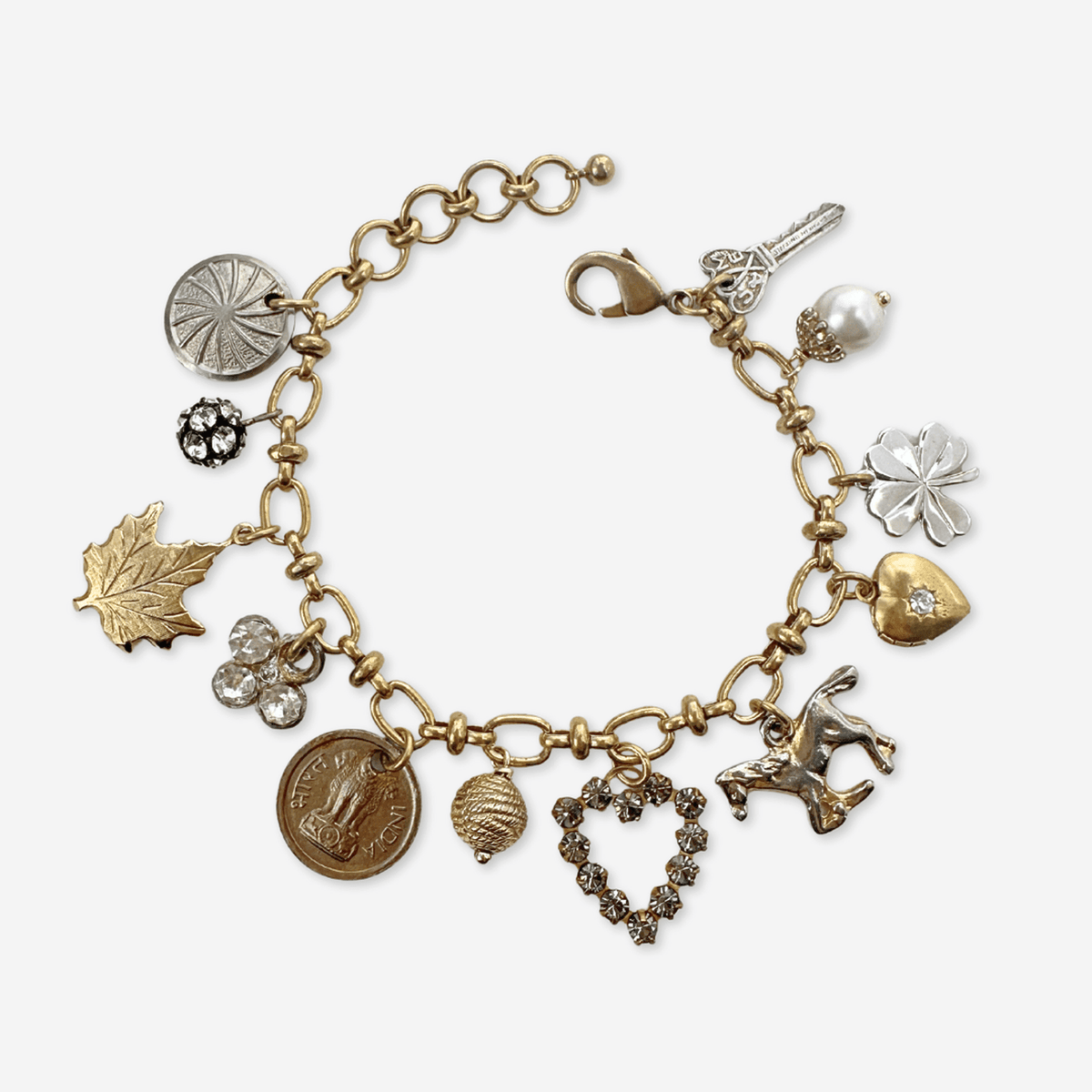 Repurposed vintage mixed metal charm bracelet