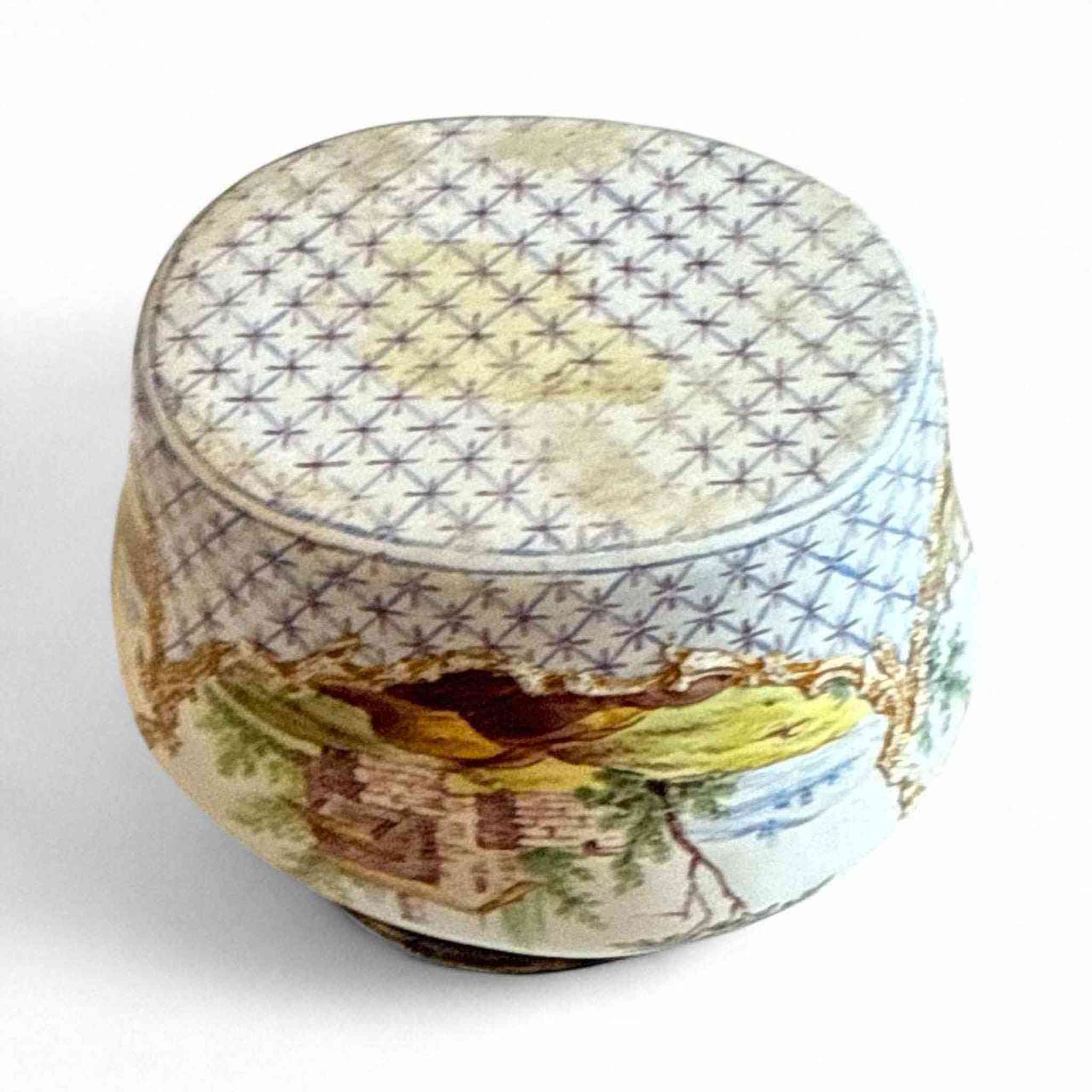 A French Porcelain Snuff Box with silver Mounts