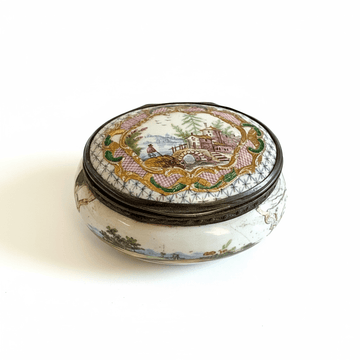 A French Porcelain Snuff Box with silver Mounts