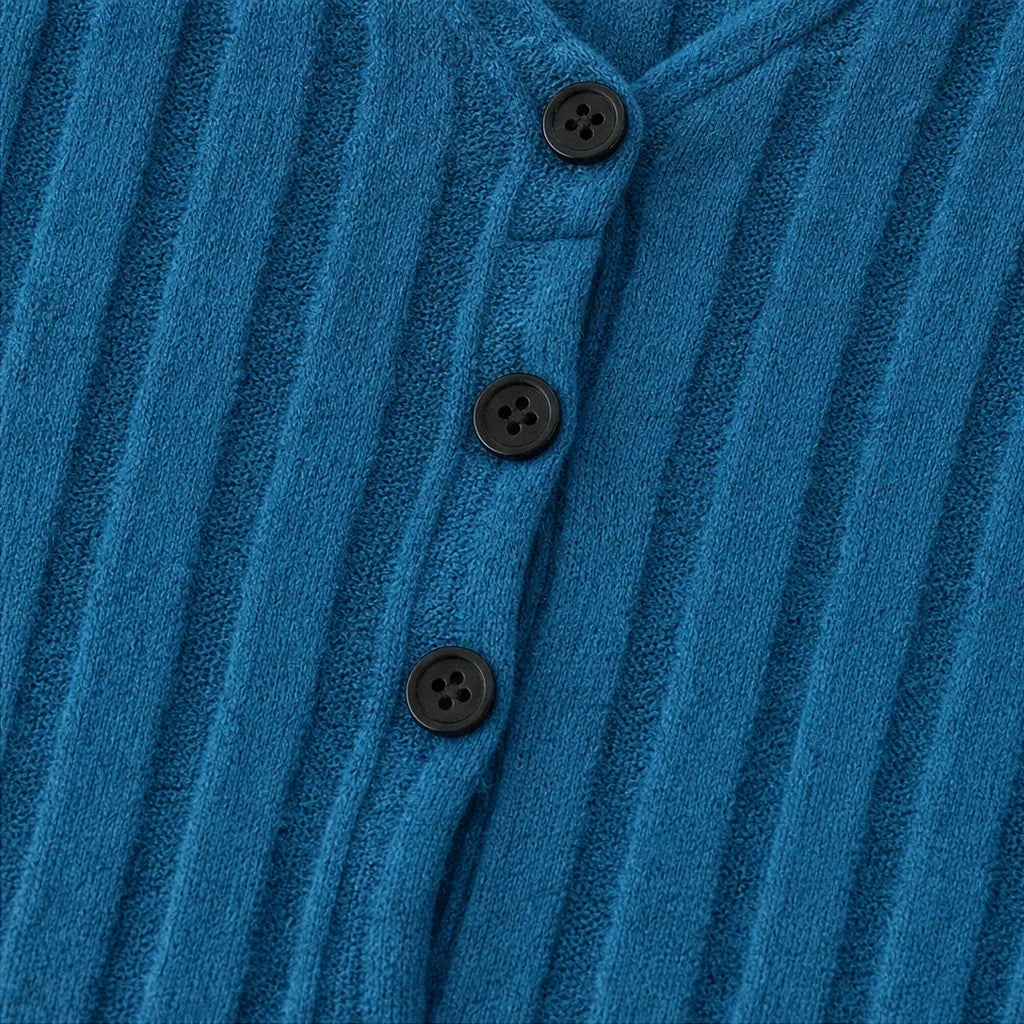 Vellora – Ribbed V-Neck Peplum Top